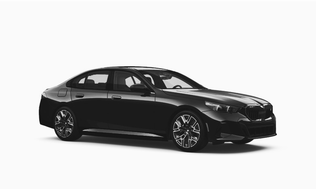 Black executive sedan parked at a private terminal